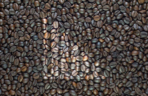 Graphiksymbol auf Kaffeehintergrund und texturiert — Stockfoto
