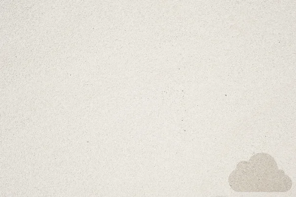 Bulut simgesi kum zemin üzerinde ve dokulu — Stok fotoğraf