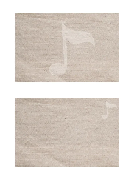 Icône de musique sur fond papier et texturé — Photo