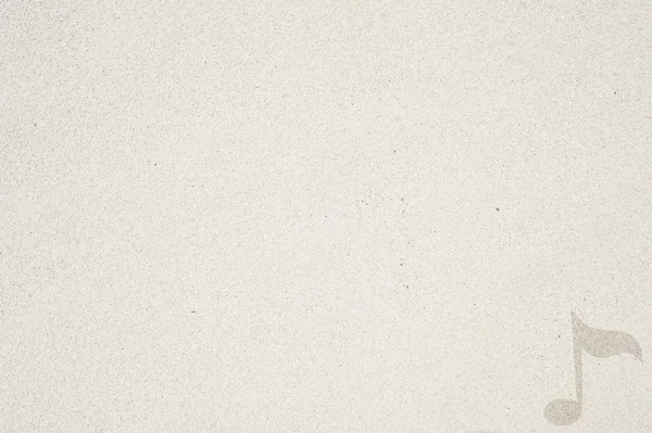 Парасолька значок на фоні піску і текстурованих — стокове фото