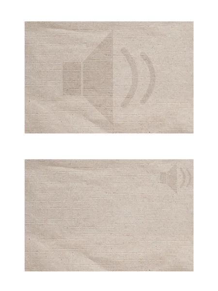 Icône haut-parleur sur fond papier et texturé — Photo