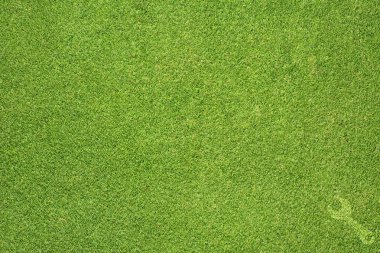 İngiliz anahtarı simgesi yeşil çim doku ve arka plan