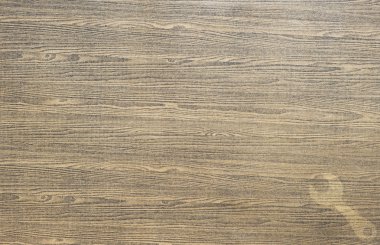 ahşap doku ve arka plan üstünde Wrench kutsal kişilerin resmi