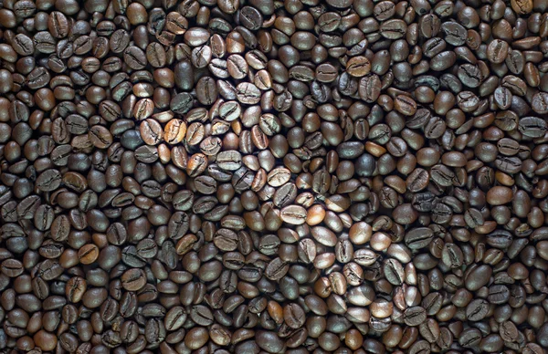 Schraubenschlüssel-Symbol auf Kaffee Hintergrund und texturiert — Stockfoto