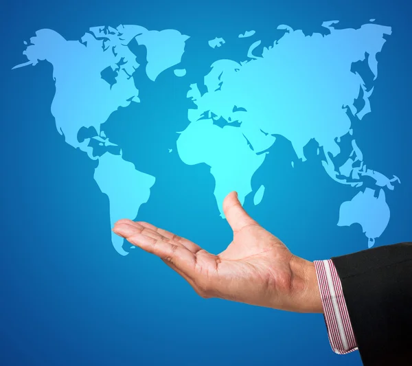 Hand with world map on a touch screen interface — Stock Photo, Image