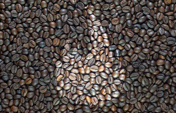 Brand ikonen på kaffe textur och bakgrund — Stockfoto