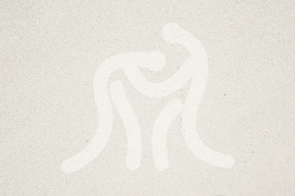Sport worstelen pictogram op zand textuur en achtergrond — Stockfoto
