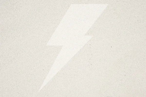 Thunderbolt on sand background and textured — Stock Photo, Image
