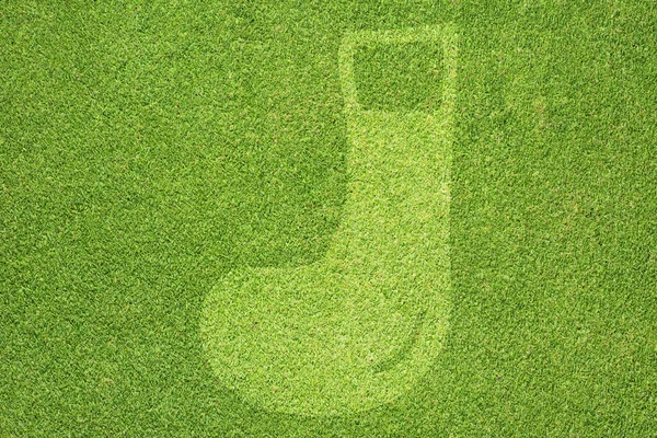 Ikona skarpety na trawa tło — Zdjęcie stockowe
