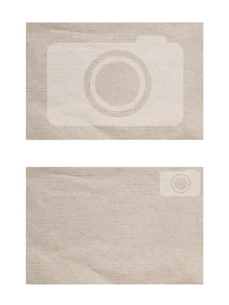 Kamerasymbolen på papper bakgrund och texturerat — Stockfoto