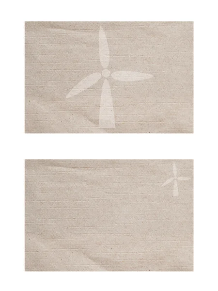 Wind turbine op papier achtergrond en textuur — Stockfoto
