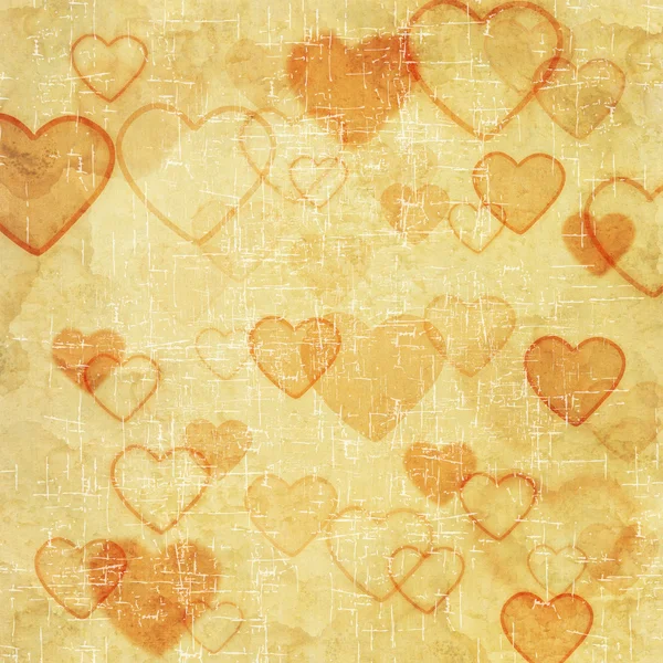 Ícone de coração no fundo de papel velho — Fotografia de Stock