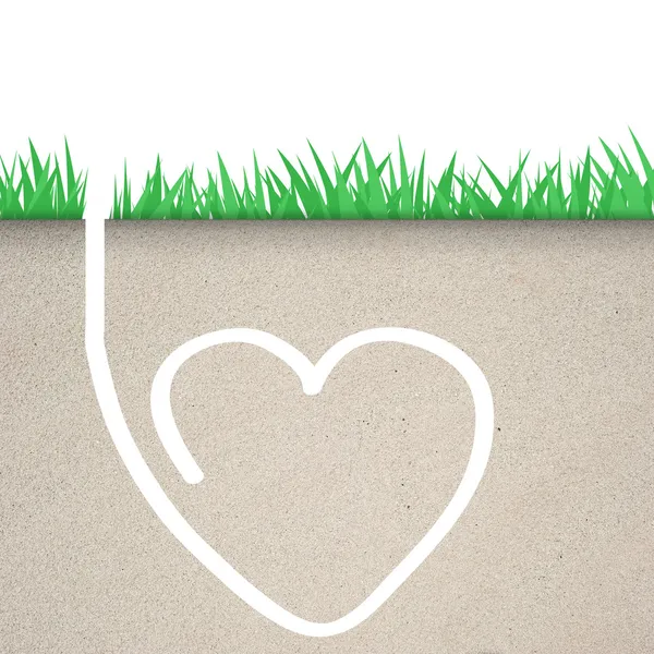 Hierba verde con icono del corazón en el suelo —  Fotos de Stock