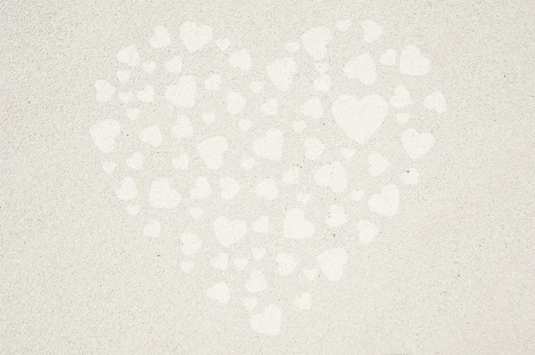 Heart on sand background and textured — Stock Photo, Image