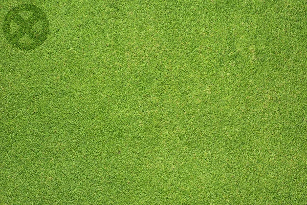 Ícone de etiqueta no fundo de grama verde — Fotografia de Stock