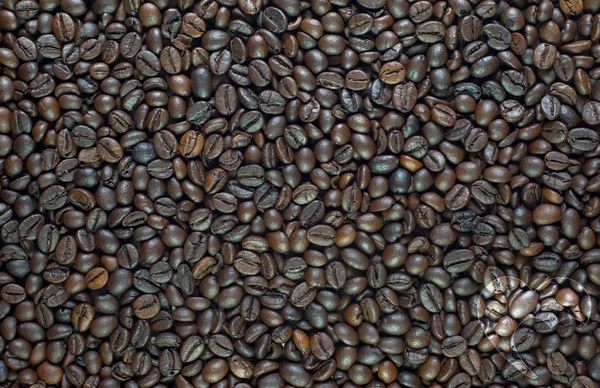 Herz auf Kaffee Hintergrund und texturiert — Stockfoto