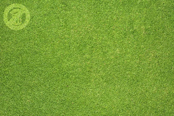 Label Prullenbak op groen gras achtergrond Rechtenvrije Stockfoto's