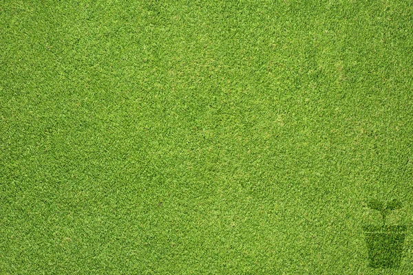 Ícone de panela na textura de grama verde e fundo — Fotografia de Stock