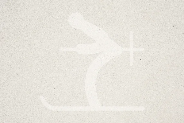 Ski icon on sand background and textured — Stock Photo, Image