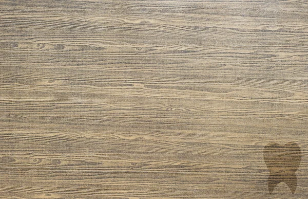 Tand-ikonen på trä textur och bakgrund — Stockfoto