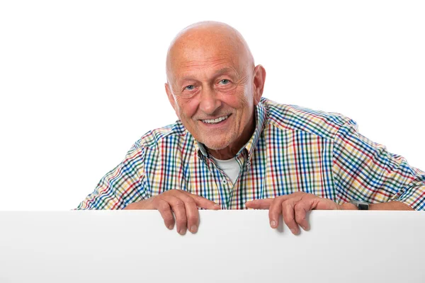 Senior man with a blank board — Stock Photo, Image