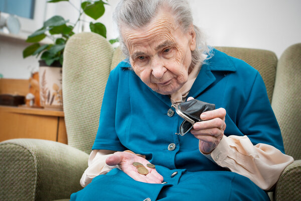 Senior woman counting money