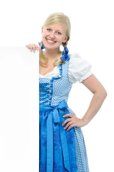 Girl in dirndl with ad space — Stock Photo, Image