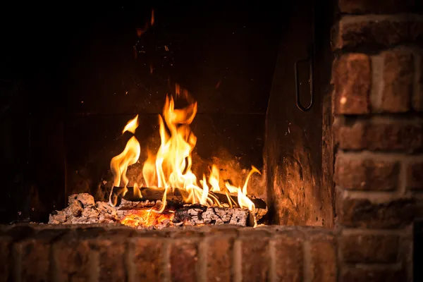 Fire in fireplace — Stock Photo, Image