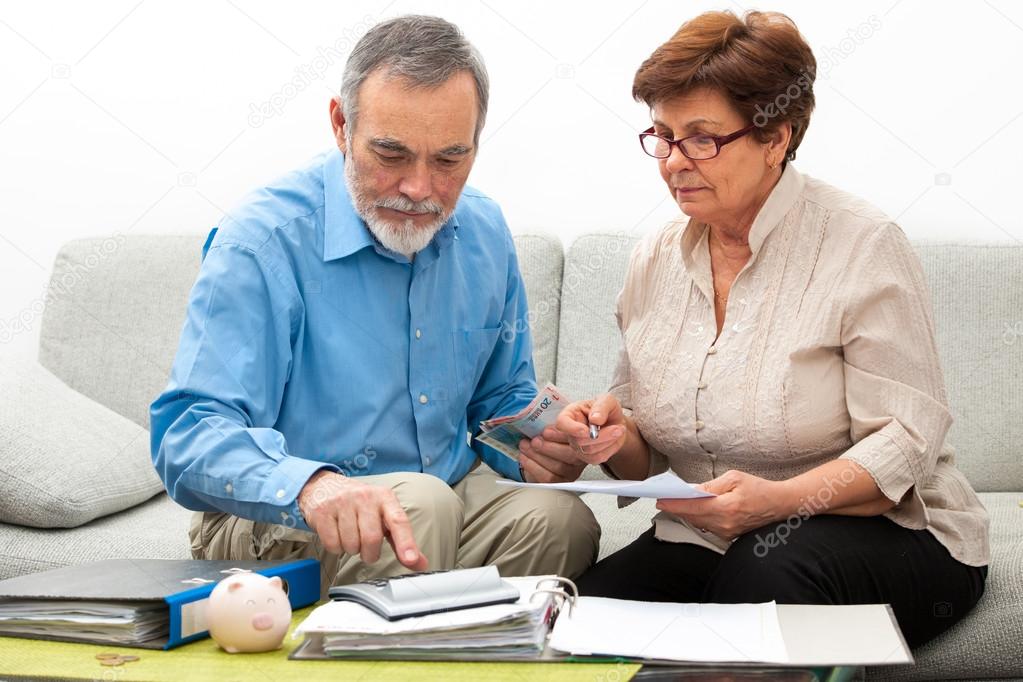 couple calculating home finances