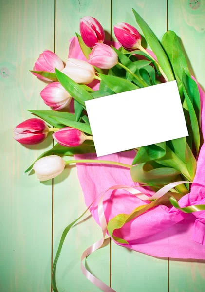 Bouquet of  tulips and card — Stock Photo, Image