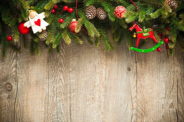 Dekorację świąteczną przez stare drewniane tła — Zdjęcie stockowe