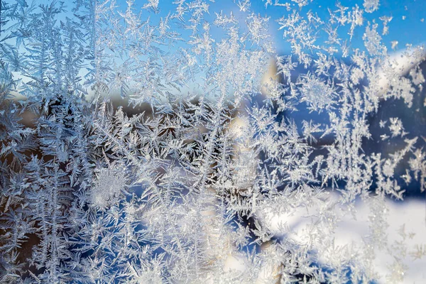 Melting ice running down a window pane, — Stock Photo, Image