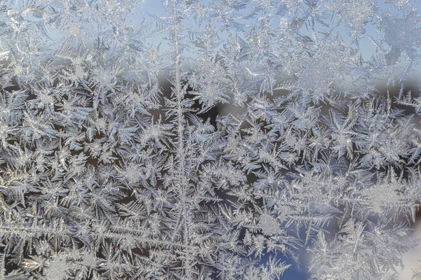 Melting ice running down a window pane, — Stock Photo, Image