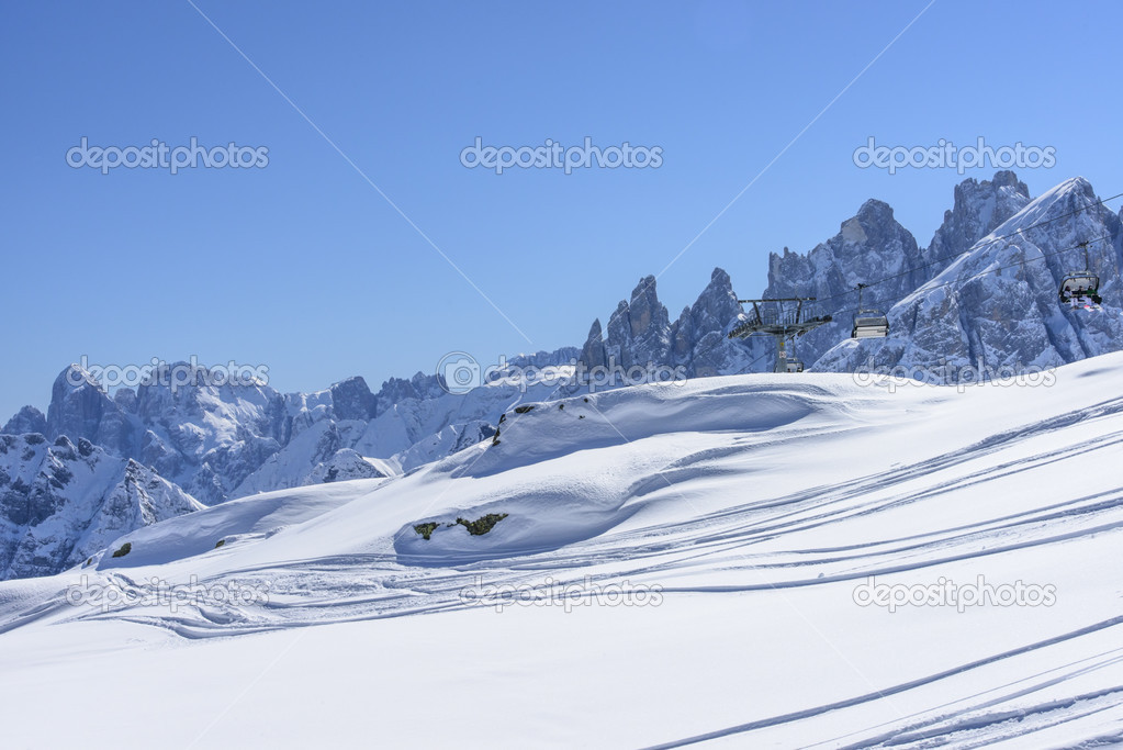 snow and chair lift at Pale range, San Pellegrino pass