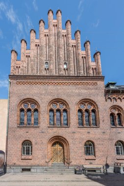 brick facade of Neo-Medieval Town Hall,  shot  in bright sun light  at Helsingor, Denmark