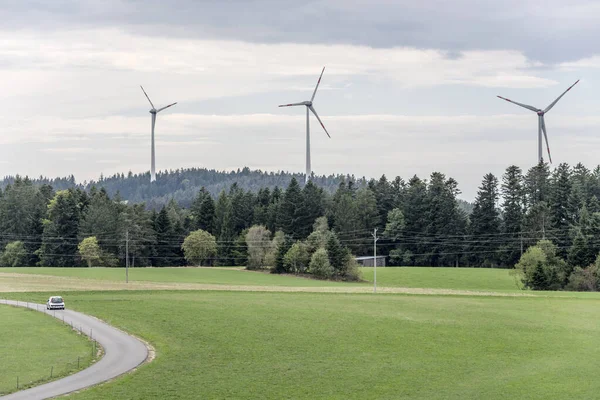Country Landscape Wind Farm Looming Out Woods Shot Summer Cloudy — Stock Photo, Image