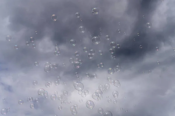 Many Soap Bubbles Flying Bright Cloudy Sky Shot Summer Park — Stock Photo, Image