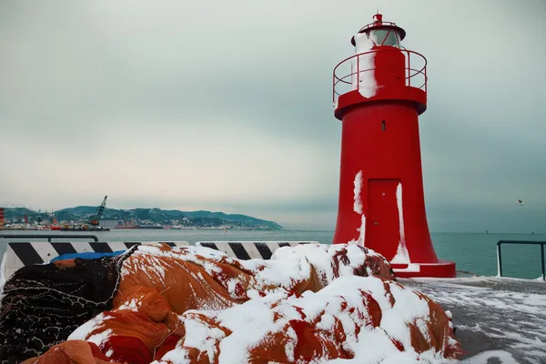 Red lighthouse in winter, La Spezia harbor — Stock Photo, Image