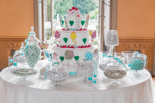 Dessert table with cake and candy for a wedding or party — Stock Photo, Image