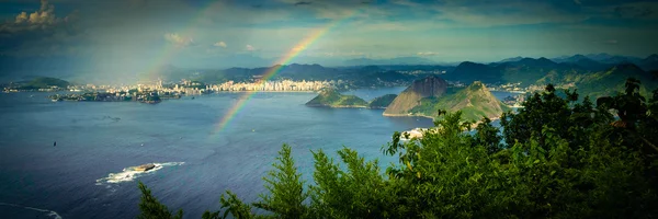 Rainbow over sea — Stock Photo, Image