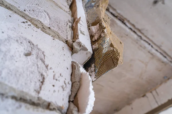 Polystyrene foam glued to an aerated concrete block wall