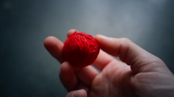 Hand Throws Ball Red Thread Fingers High Quality Fullhd Footage — Stockvideo