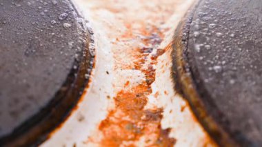 Burnt pollution of electric stove is sprayed with foam detergent close-up. High quality 4k footage