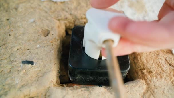 Connecting Electrical Appliance Old Socket Old Clay Wall Close High — Vídeo de stock