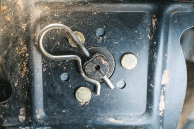 Spring cotter pin close-up on a cultivator attachment
