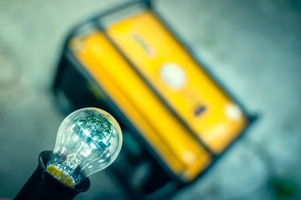 Incandescent Light Bulb Close Background Yellow Gas Generator — Stockfoto