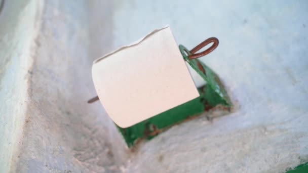 Roll Cheap Toilet Paper Sways Paper Holder Close Rustic Toilet — Vídeo de Stock