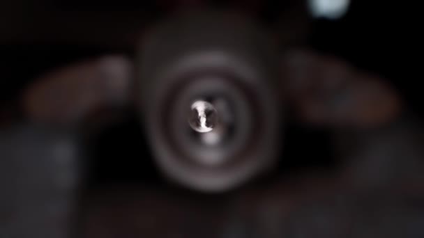 Close Sharp Shiny Front Part Drill Rotates Dark Blurred Background — Wideo stockowe