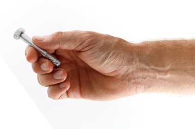 Metal bolt fastener in hand isolate