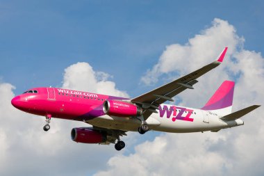 LVIV, UKRAINE - September 12, 2021: Wizz Air plane in flight. The plane is flying.